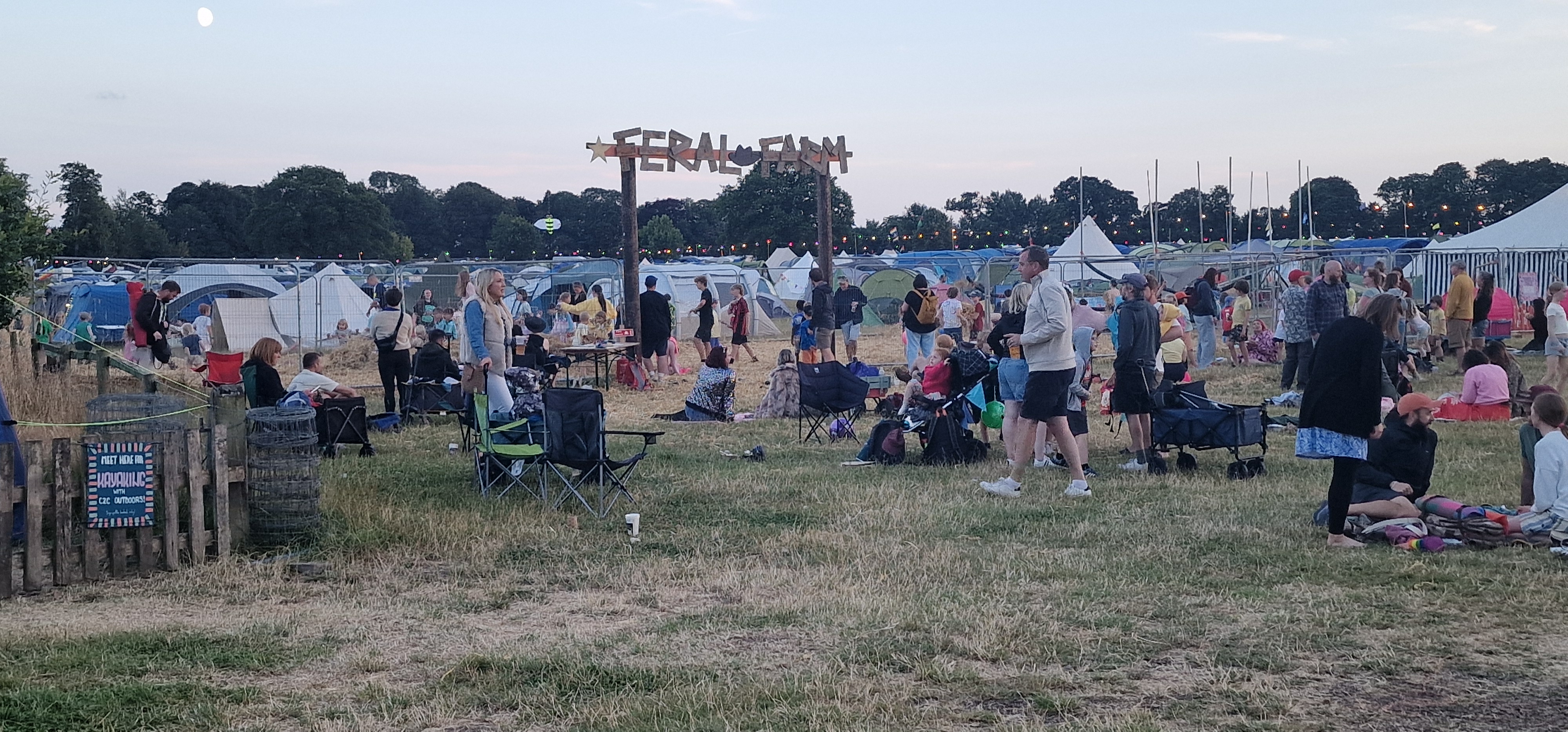Deershed Festival 2026 Feral Farm area at dusk with moon in the sky