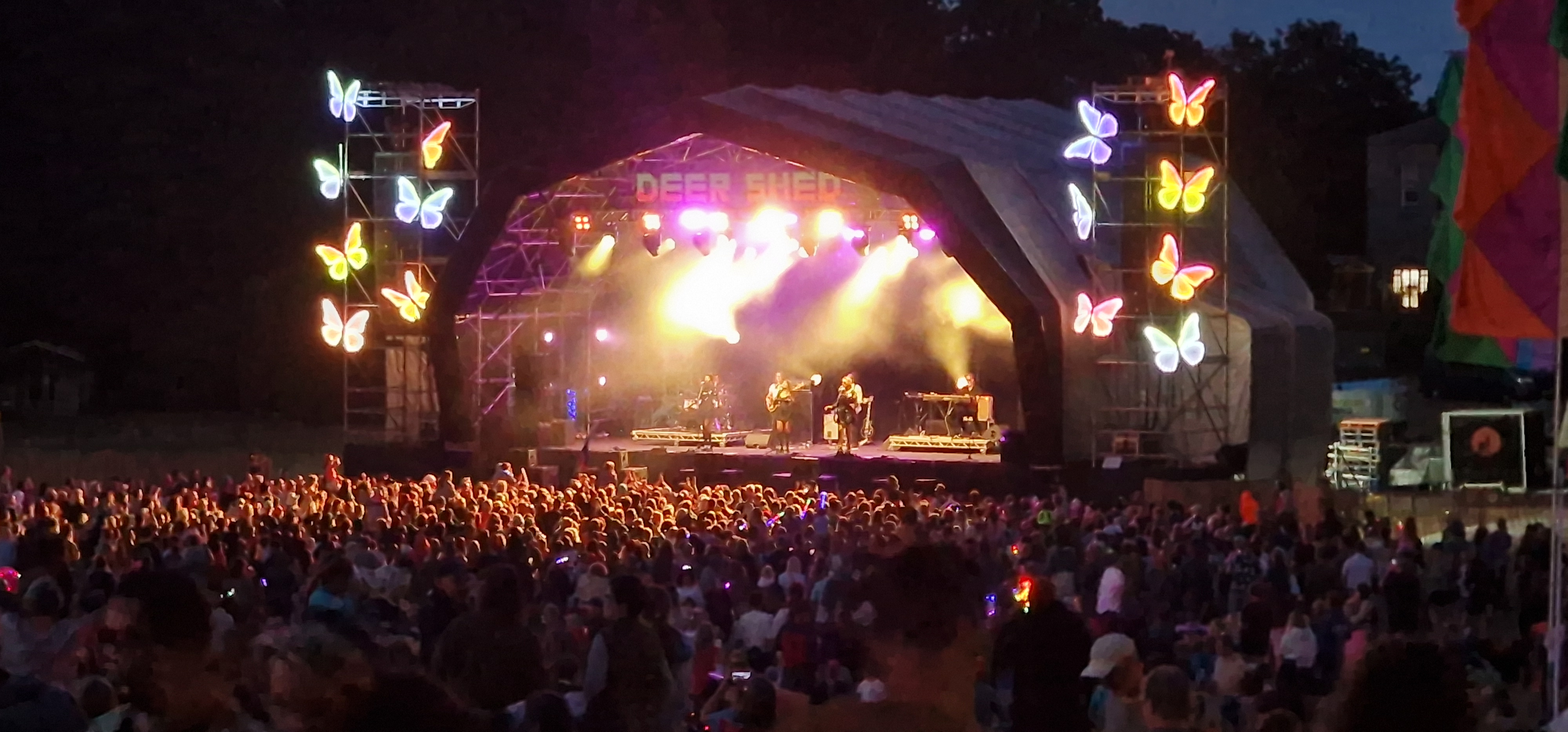 Deershed main stage with full crowd and live band performing at night